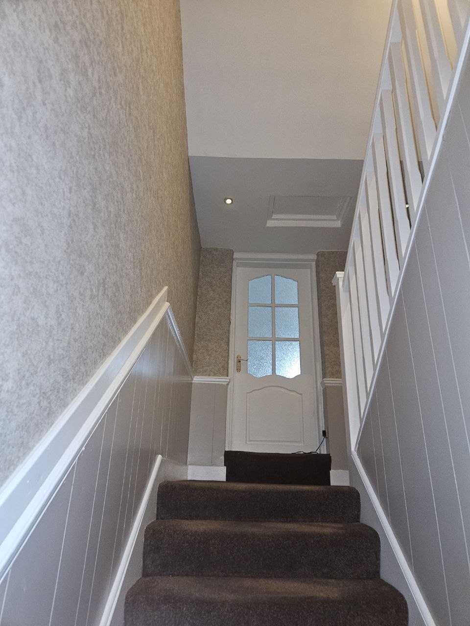 hallway painted, woodwork painted and panelling painted